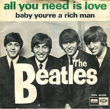 album cover of the music band called Beatles where they highlight that all you need is love